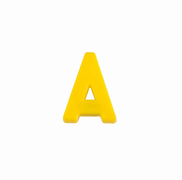 Letter A of the alphabet - Piece in yellow plastic — Stock Photo, Image