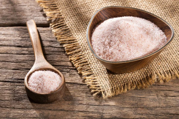 Fine grains of pink Himalayan salt, powder red rock salt from Pakistan