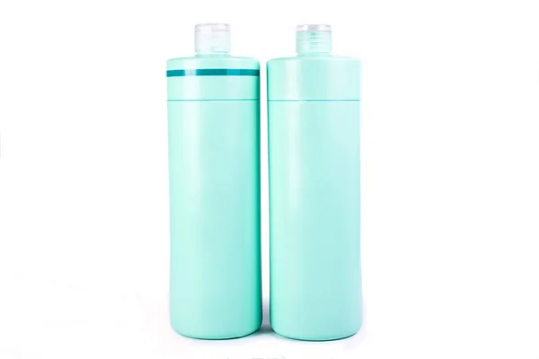 Dos grandes botellas de plástico azul isloated en el fondo blanco Imagen De Stock