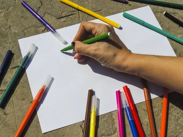 White sheet of paper with markers. View from above — Stock Photo, Image