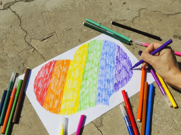 Photo of the rainbow heart on the asphalt. Symbols of LGBT people. — Stock Photo, Image