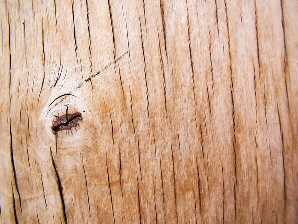 Fondo de madera con grietas. Tablero texturizado con grietas — Foto de Stock