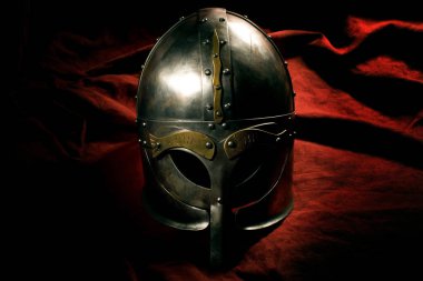 Viking helmet isolated on background a red material clipart