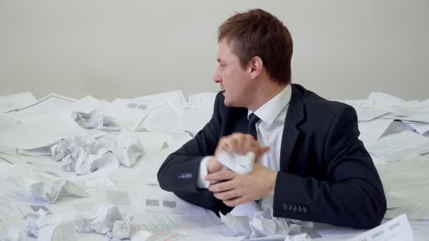 The man in the office drowning in paper — Stock Footage The man in the office drowning in paper Stock Video