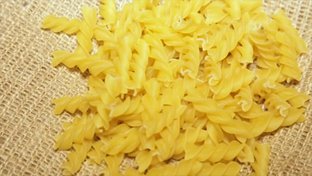 Pasta on sacking, while rotating, close-up.slow motion — Stock Video