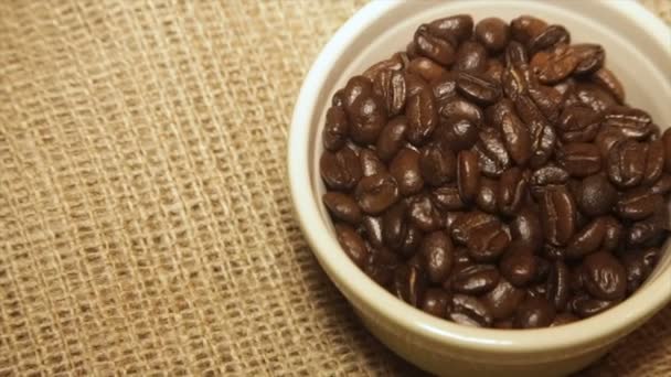 Serve coffee beans in rotation.Full hd video — Stock Video