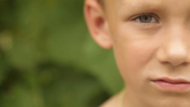 Part of the pensive boy's face — Stock Video