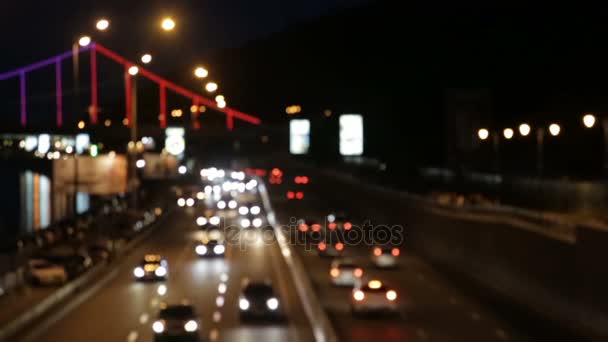 Auto bokeh op de snelweg van de nacht — Stockvideo