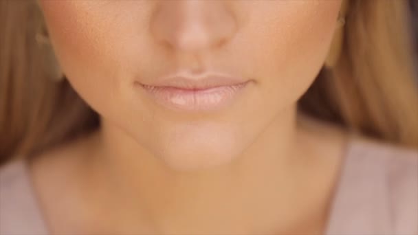 The girl is smiling at the camera.Close-up portrait — Stock Video