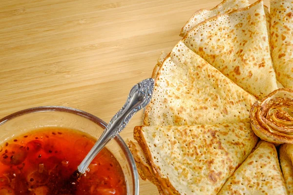 A stack of fried pancakes with jam. — Stock Photo, Image