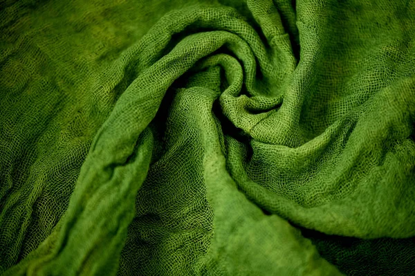 Tessuto, ritorto in una garza di fiori. Verde . — Foto Stock