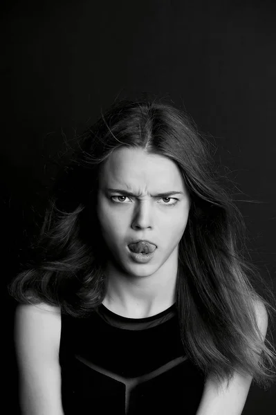 Young girl with long hair. Daring look in . BW — Stock Photo, Image