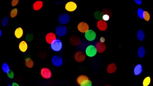 Bokeh lys. Nydelig julebakgrunn. Jul og nyttår. Julebakgrunn Abstrakt julebakgrunn med lysbokeh – stockvideo