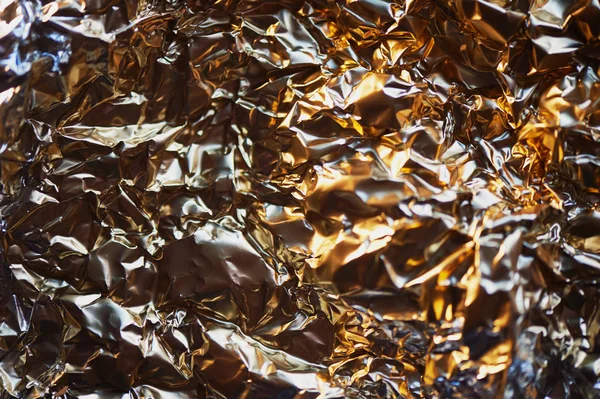 Textura da folha de alumínio. Vista panorâmica. Ouro — Fotografia de Stock