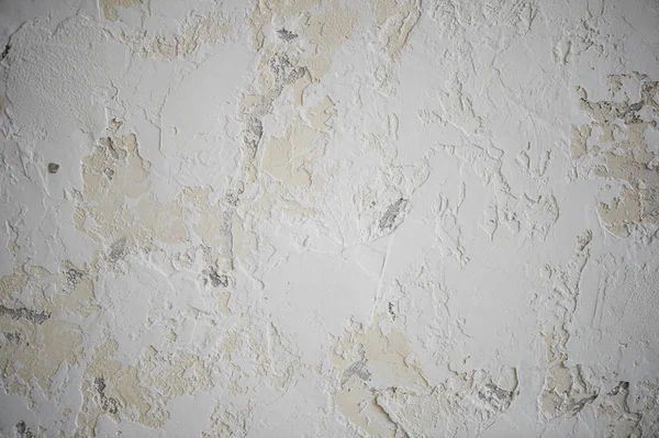 The texture, the creamy wall, it is marked by white smears of putty. Close — Stock Photo, Image