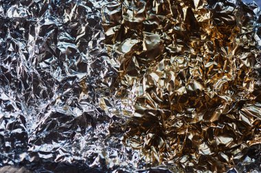 Alüminyum folyo doku. Görünüm süzül. Yarım altın, yarı gümüş