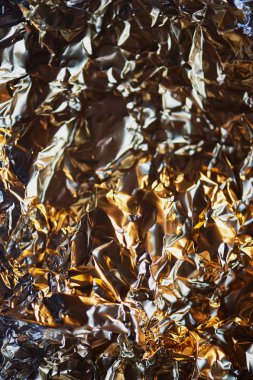 Alüminyum folyo doku. Görünüm süzül. Altın