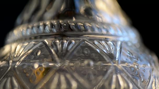 Decanter of sparkling water.Moist drops flow down on the walls — Stock Video