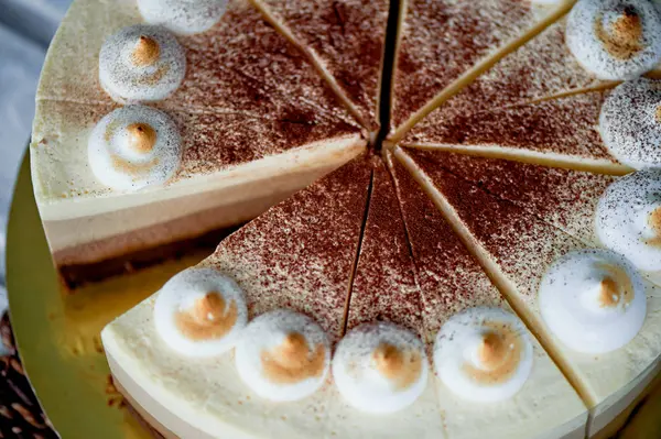 Lovely cake , decorated with chocolate and small meringues. The view from the top. A work of culinary art — Stock Photo, Image