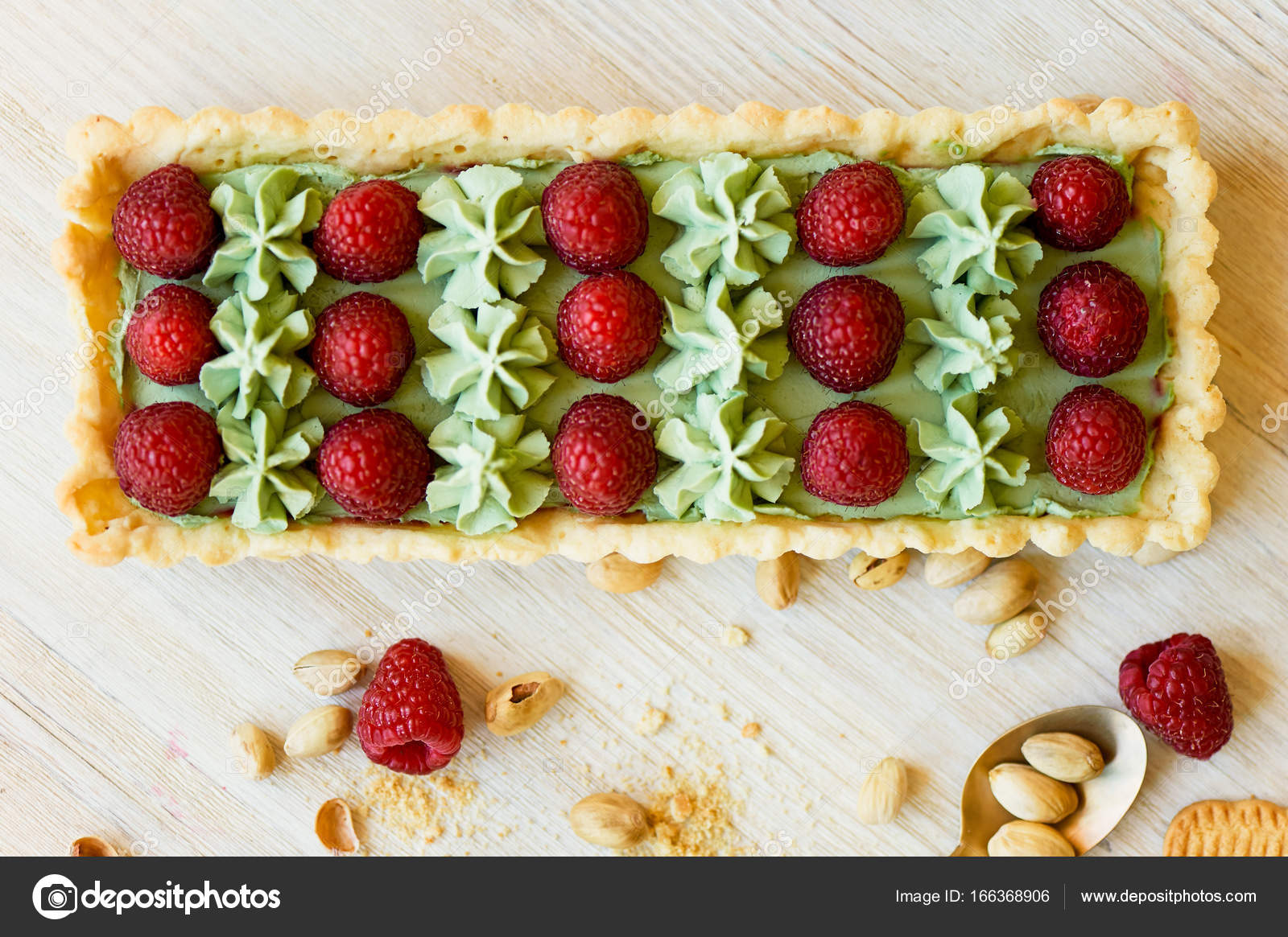 Pistachio tart. Pistachio tart on white Belgian chocolate BARRY with a