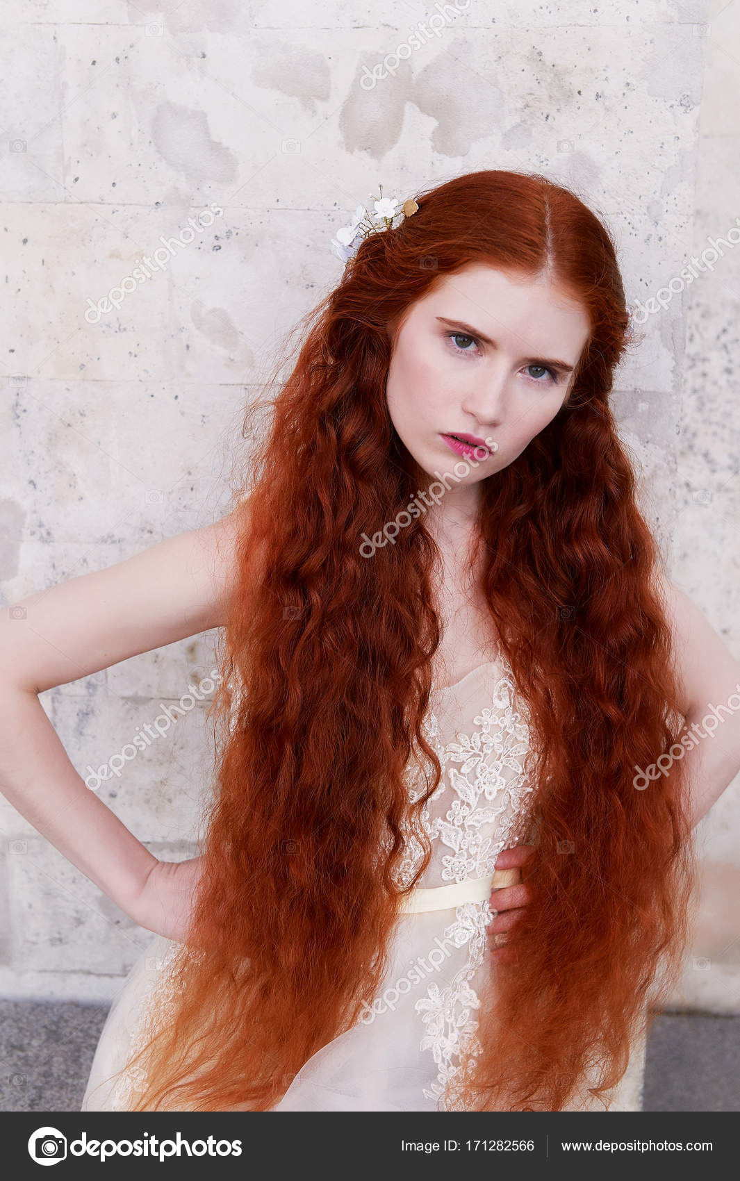Beautiful Red Haired Girl With Long Curly Hair In The Bride In A