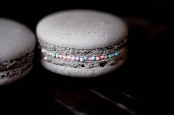 La foto en el esquema gris oscuro.Pastel gris macaron. Macro — Foto de Stock