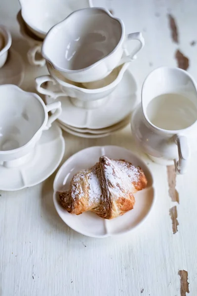 Charming French Breakfast white set and croissants. — Stock Photo, Image