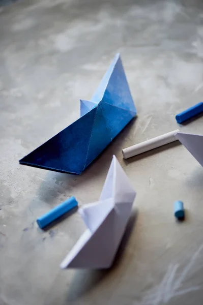 Dreams about the sea. A symbol of travel and freedom. A ship made of paper.Pastel crayons. — Stock Photo, Image