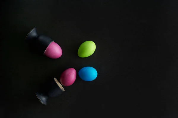 Painted eggs on a black background.Dietary protein diet. Minimalism. — Stock Photo, Image