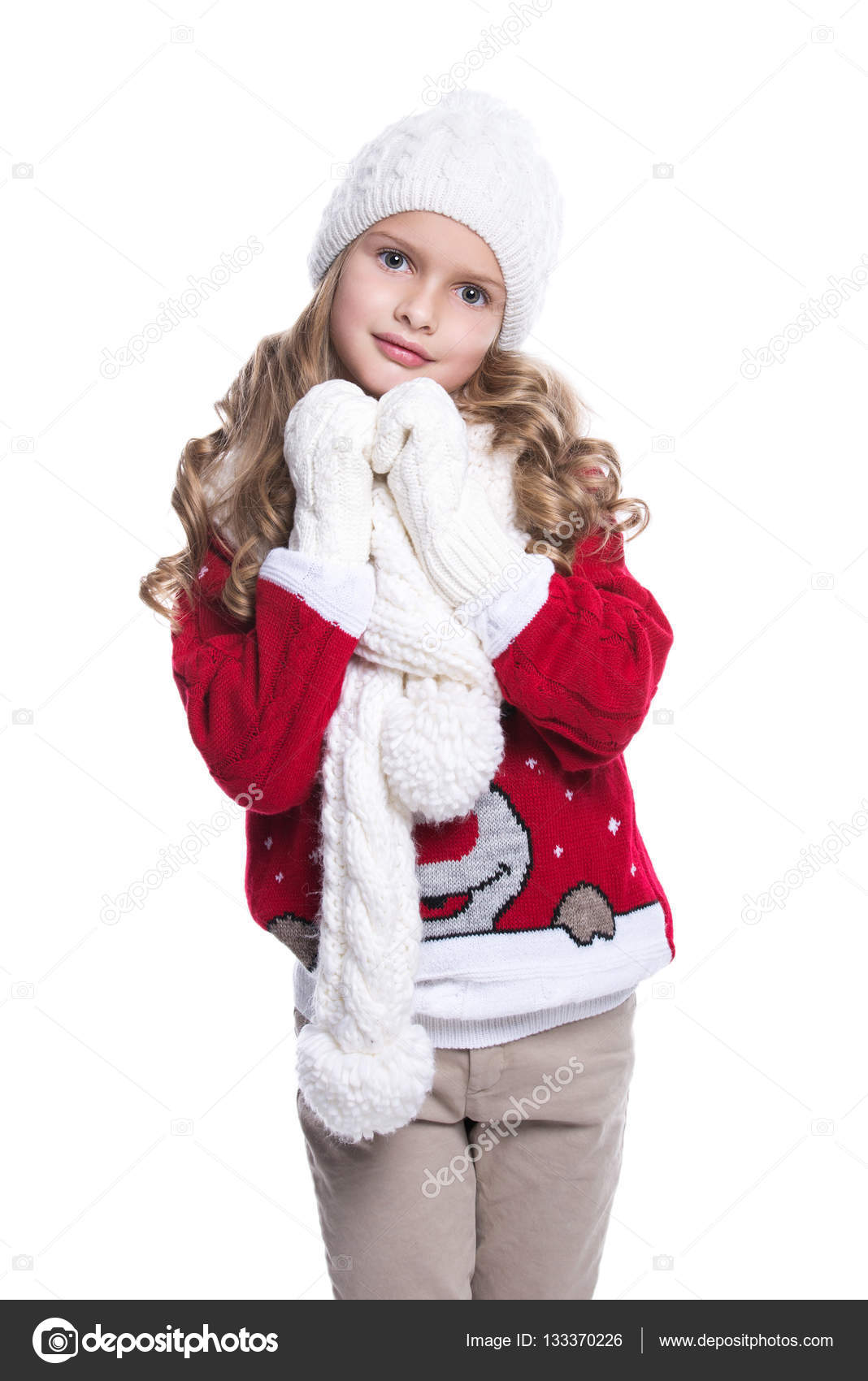 Cute Smiling Little Girl With Curly Hairstyle Wearing Knitted