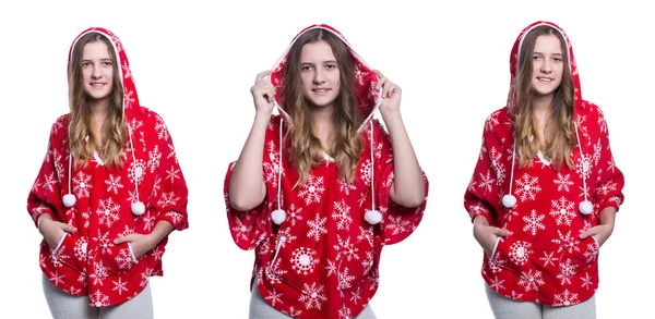 Linda menina adolescente alegre posando no estúdio. Usando capuz de inverno vermelho com flocos de neve. Isolado em fundo branco. Roupas de inverno. Imagem composta . — Fotografia de Stock