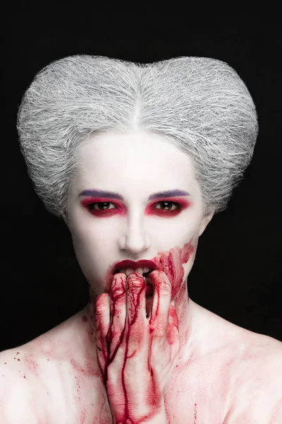 Mysterious beauty portrait of snow queen covered with blood. Bright luxury makeup. Gore dripping from the mouth. — Stock Photo, Image