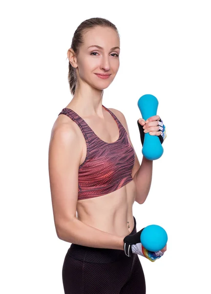 Happy sporty woman with blue dumbbells doing sport exercise. Isolated on white background. — Stock Photo, Image