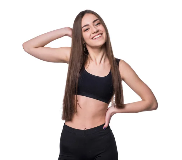 Giovane sorridente fitness-girl in stile sportivo isolato su sfondo bianco. Stile di vita sano concetto . — Foto Stock