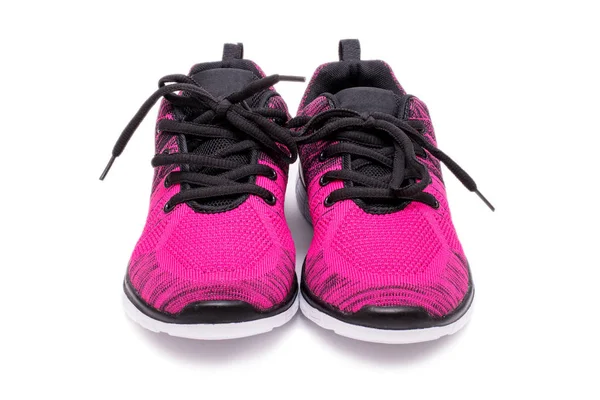 Par de rosa e preto esporte mulher sapatos isolados no fundo branco . — Fotografia de Stock