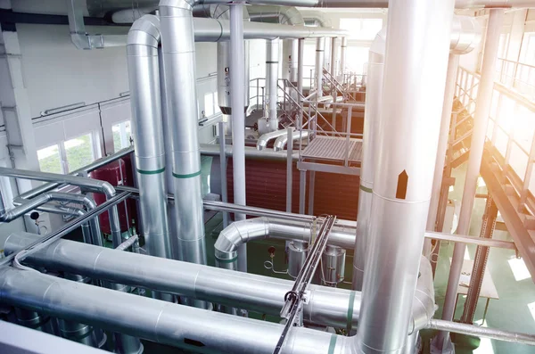The interior of a modern industrial gas boiler room. Pipelines, — Stock Image The interior of a modern industrial gas boiler room. Pipelines, Royalty Free Stock Images