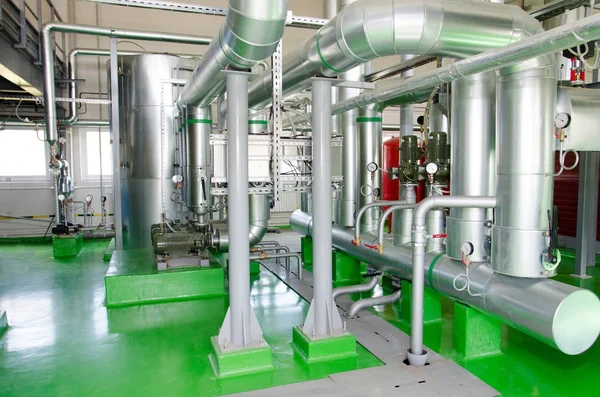 The interior of a modern industrial gas boiler room. Pipelines, — Stock Image The interior of a modern industrial gas boiler room. Pipelines, Royalty Free Stock Photos