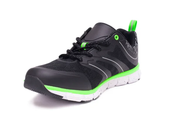 Limão verde e preto esporte unissex sapatos isolados no fundo branco . — Fotografia de Stock