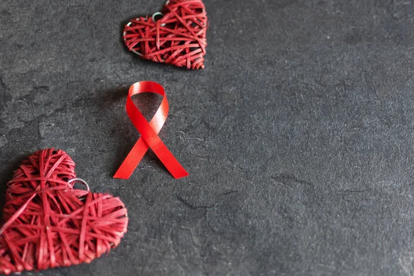 World aids day December 1 with red ribbon, campaign help people with living with HIV.