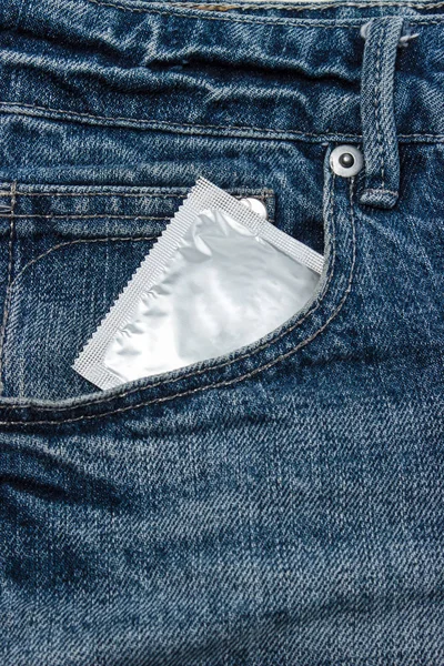 Condoms in package in jeans. — Stock Photo, Image