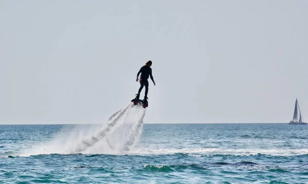 Water attraction flyboard on the beach of Sochi — 图库照片