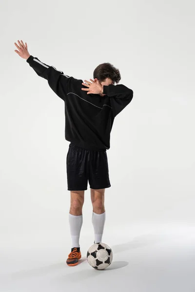 Confident Soccer Player Black Sportswear Showing Gesture Winner Isolated Grey — Stock Photo, Image