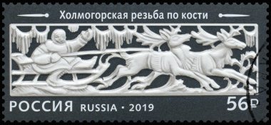 Kholmogorsk bone carving. Russia stamp 2019