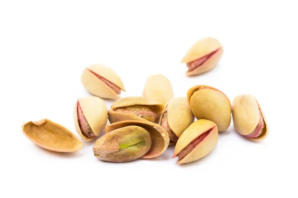 Pile of roasted pistachios isolated on white background — Stock Photo, Image