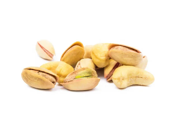 Stapel geroosterde pistachenoten en cashewnoten — Stockfoto