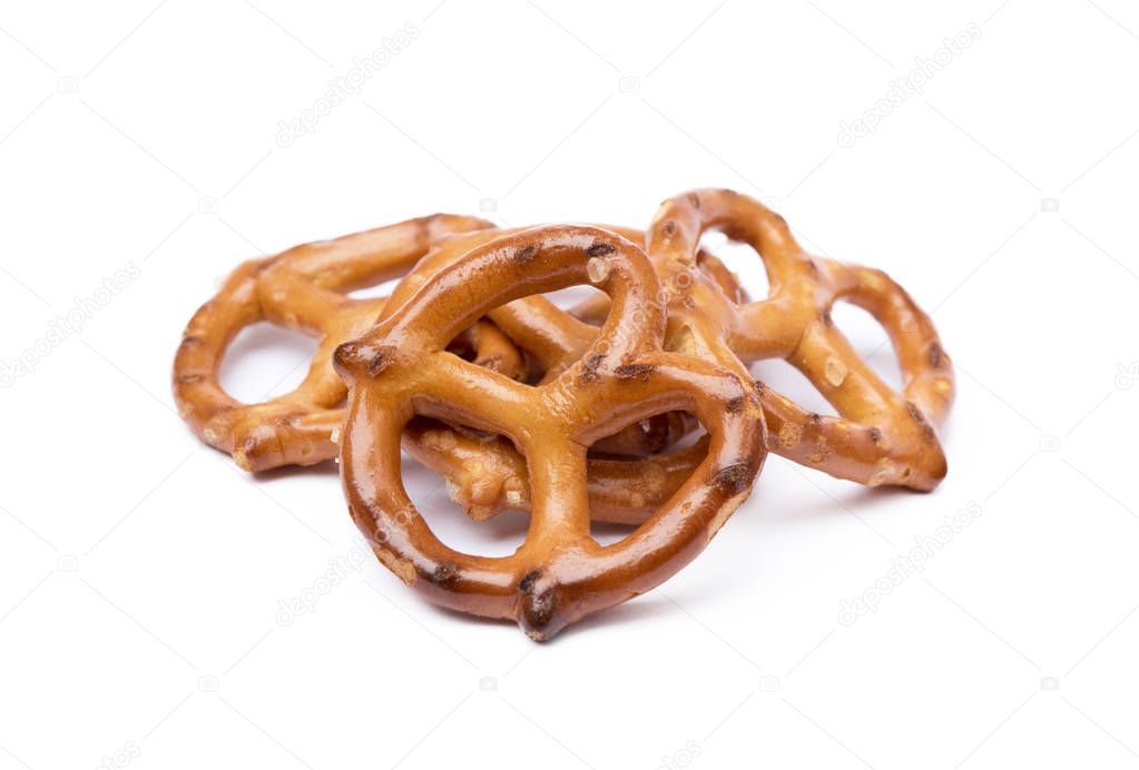 Salty cracker pretzel isolated on white background