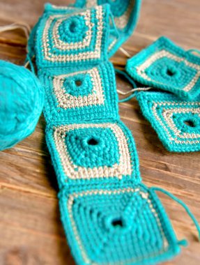 crochet work in many colors with hook needle .