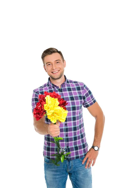 Ragazzo con fiori su uno sfondo bianco Immagini Stock Royalty Free