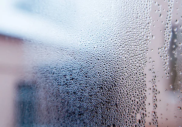 Winter. Raining. Water bubbles on a window — Stock Photo, Image