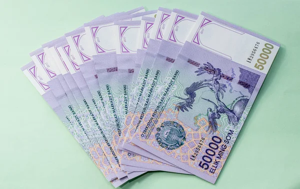 Özbek banknotlar. Elli bin Özbek toplamları